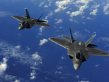 U.S. Air Force F-22 Raptors in Flight Near Guam Fotografie-Druck von  Stocktrek Images