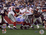 Eli Manning Autographed Super Bowl XLII Escaping Tackle Photo Photo