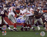 Eli Manning Autographed Super Bowl XLII Escaping Tackle Horizontal Photo Photo