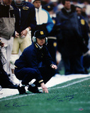 Lou Holtz And Ken Regan Dual Autographed Holtz Inscribed '1990' Crouching On Sideline Photograph Photo