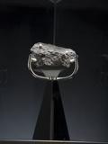 A 4.7. Ounce Moon Rock Photographic Print by Tyrone Turner