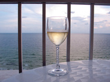 A Glass of White Wine on the Balcony of a Condo at Gulf Shores Fotografie-Druck von National Geographic Photographer