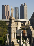 Morning Light on Tombs in the Oakland Cemetery with Atlanta Skyline Photographic Print by Krista Rossow
