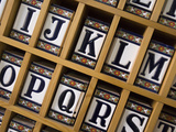 Detail of Tile Letters in a Ceramics Shop in Triana Photographic Print by Krista Rossow