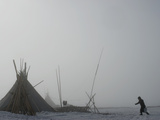 A Komi Reindeer Herder Carries Snow to Her Chum to Melt for Water Photographic Print by Gordon Wiltsie