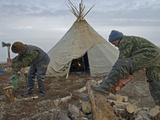 A Nomadic Komi Reindeer Herders Chops and Saw Wood to Heat their Chum Photographic Print by Gordon Wiltsie