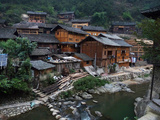 Wooden Houses Line the Duliu River in Xijiang Photographic Print by O. Louis Mazzatenta