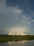 Thunderheads Billow over the Amazon Jungle and Yanayacu River in Peru Photographie par Gordon Wiltsie