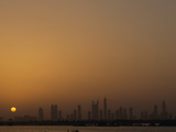 Silhouette of Dubai Skyline at Sunset Photographic Print by Maggie Steber