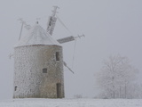 Traditional Windmill and Trees Covered with Frost Photographic Print by Joe Petersburger