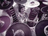 Men in Sombreros Surround a Woman Wearing a China Poblana Photographie par B. Anthony Stewart
