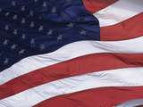 An American Flag Waving Gently in a Breeze Photographie par Paul Damien