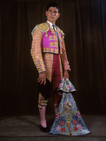 A Matador Poses in Full Regalia with an Embroidered Cape Impressão fotográfica por Luis Marden