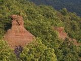 Rock Formation Called Babas Szerkovek Loom Above the Forest Canopy Photographic Print by Joe Petersburger