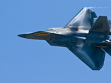 An F22 Raptor Fighter Jet Performing at a Military Air Show Photographic Print by Brian Gordon Green