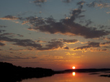 Sunset over the Chincoteague National Wildlife Refuge Photographie par Karen Kasmauski