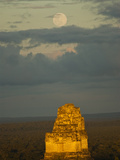 The Moon and Clouds over the Mayan Pyramid at Tikal Photographic Print by Karen Kasmauski