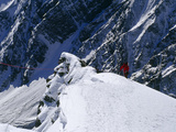 A Climber Ascends a Steep Section of Ice on Nanga Parbat's Slopes Photographic Print by Tommy Heinrich