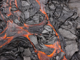 Orange Lava Glowing under Black Hardened Lava Photographie par Patrick McFeeley