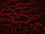 Molten Rock Cools and Forms Plates on the Surface of a Lava Lake Photographic Print by Carsten Peter