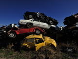 A Pile of Discarded Cars at a Junkyard Photographie par Raul Touzon