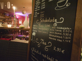 A Sign Outside a Coffee Shop Photographic Print by Greg Dale
