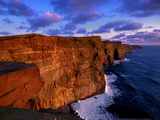 Sunset at the Cliffs of Moher on the West Coast of Ireland Photographic Print by Chris Hill