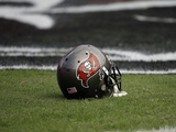 Saints Buccaneers Football: Tampa, FL - A Tampa Bay Buccaneers Helmet Photographic Print by John Raoux