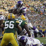 Vikings Packers Football: Green Bay, WI - Adrian Peterson Fotografie-Druck von Mike Roemer