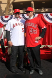 Los Angeles Angels of Anaheim, CA - December 10: Newly Signed Albert Pujols and C.J. Wilson Photographic Print by Stephen Dunn
