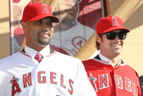 Los Angeles Angels of Anaheim, CA - December 10: Newly Signed Albert Pujols and C.J. Wilson Photographic Print by Stephen Dunn