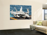 A Us Navy F/A-18C Hornet Tied on the Flight Deck of Uss Nimitz Wall Mural by Stocktrek Images 