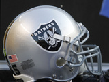 Raiders Steelers Football: Pittsburgh, PA - An Oakland Raiders Helmet Photographic Print by Keith Srakocic