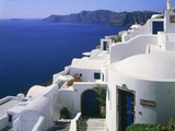 Apartment block in Oia, Santorin, Greece Photographic Print by Guenter Rossenbach