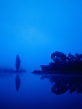 Landscape around a lake in the dawn Photographic Print by Herbert Kehrer