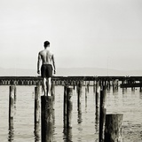 Young Man on Piling Photographic Print by JoSon 