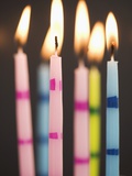 Six Lit Birthday Candles Photographic Print by Tom Grill