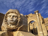 Sculpture of Medusa's Head at Leptis Magna Photographic Print by Wolfgang Kaehler