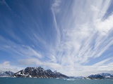 Cirrus Clouds Over Fjord in June Photographie par Theo Allofs