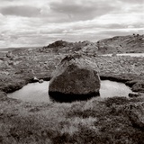 Rock in water at coast (black nad white) Photographic Print by Mika 