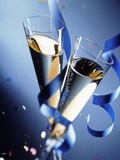 Two champagne glasses and ribbons Photographic Print by Christian Schmidt
