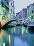 Bridge above a channel in Venice, evening shot Fotografie-Druck von Guenter Rossenbach