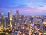 Singapore Skyline at Dusk Photographic Print by Paul Hardy