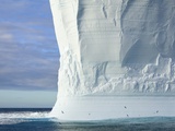 Massive Tabular Iceberg  Sculpted by Waves Photographic Print by John Eastcott & Yva Momatiuk