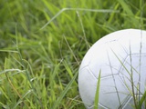 Abandoned Soccer Ball in Grass Photographic Print by Aflo 