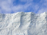 Blue Tabular Iceberg Sculpted by Waves Photographic Print by John and Yva Eastcott And Momatiuk