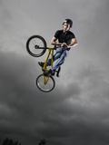 BMX Biker Performing Tricks Photographic Print