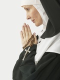 Praying Nun Holding Rosary Fotografisk tryk Praying Nun Holding Rosary Fotografisk tryk