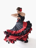 Salsa dancer twirling her skirts Photographic Print by Jose Luis Pelaez