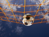 Soccer Ball Going Into Goal Net Photographic Print by Randy Faris